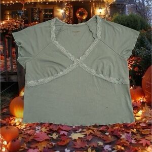 Green top with lace trim